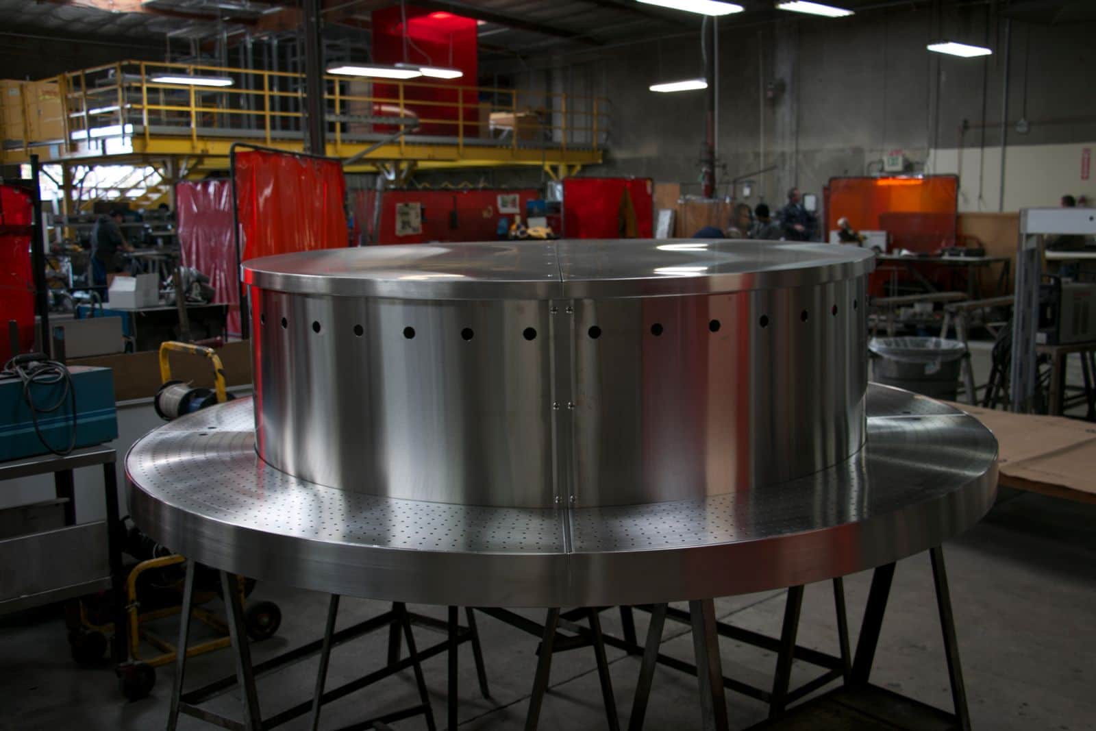 Custom stainless piece on fabrication stands in the Low's shop