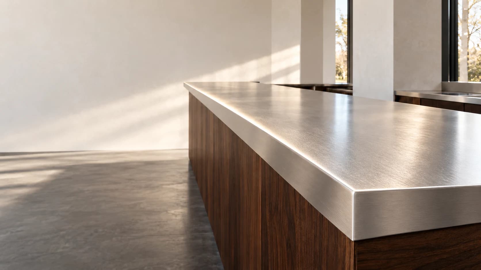 Digital appearance study of an installed stainless bar top with a restrained formed edge in architectural daylight