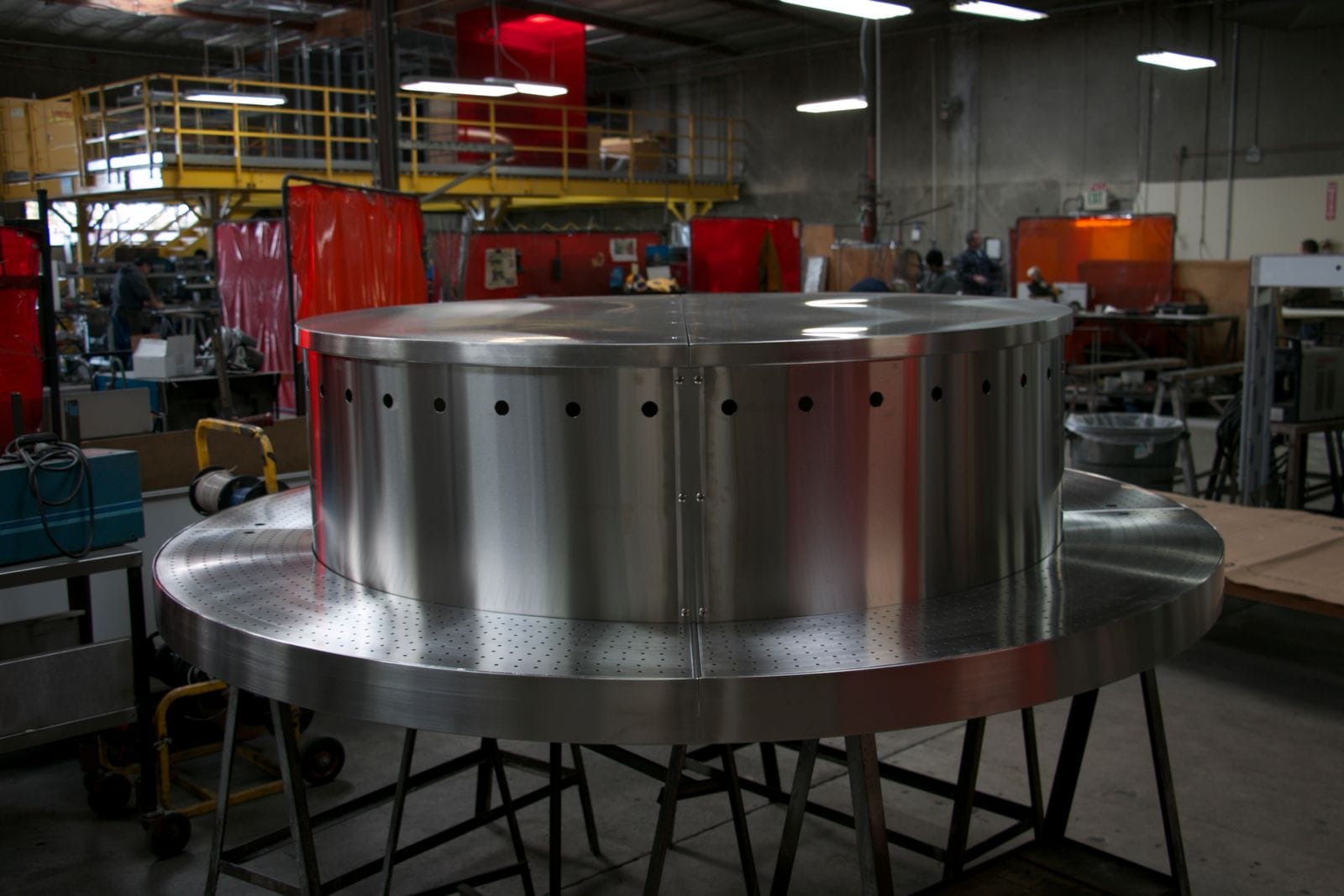 Custom stainless piece on fabrication stands in the Low's shop